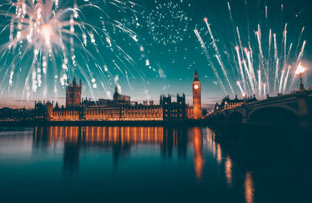 Big Ben with fireworks - celebration of the New Year at the House of Parliament, London, United Kingdomの写真素材