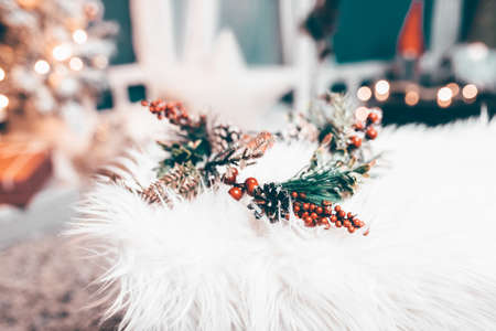 Christmas wreath on white fur. Christmas decor homemadeの写真素材