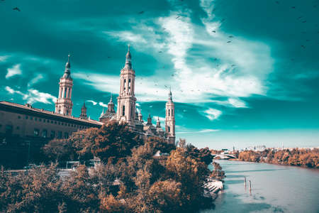 View to the Cathedral-Basilica of Our Lady of the Pilla in the city of Zaragoza, Aragon (Spain)の写真素材