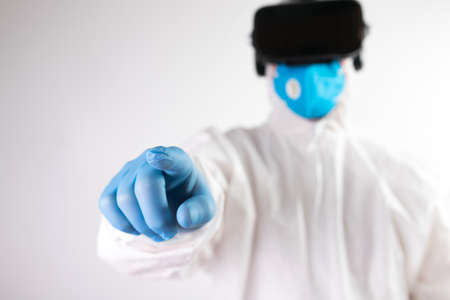 VR medicine. Doctor using virtual reality headset for medical purposes.の写真素材