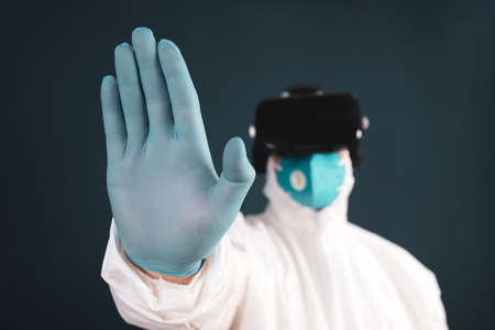 VR medicine. Doctor using virtual reality headset for medical purposes.