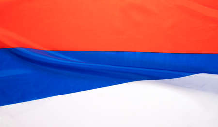 Waving colorful national flag of russia. Russian-Ukrainian conflict concept