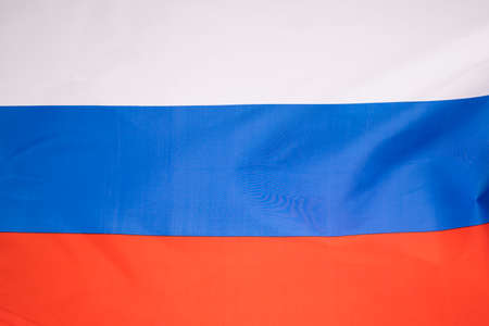 Waving colorful national flag of russia. Russian-Ukrainian conflict conceptの写真素材