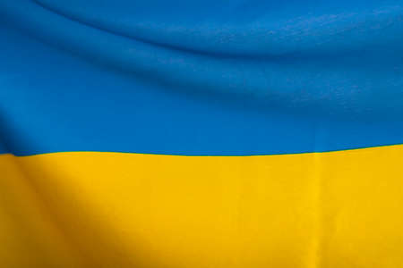 Flag of Ukraine. Blue and yellow colors. Close up shot, backgroundの写真素材
