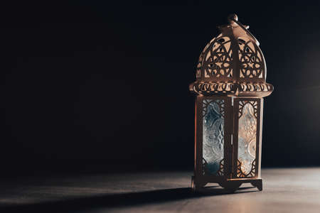 Ramadan Kareem background. Ornamental Arabic lantern glowing at nightの写真素材