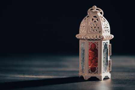 Ramadan Kareem background. Ornamental Arabic lantern glowing at nightの写真素材