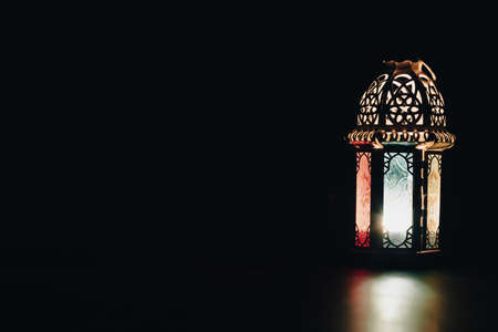 Ramadan Kareem background. Ornamental Arabic lantern glowing at nightの写真素材