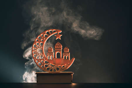 Ramadan Kareem background. Ornamental Arabic lantern glowing at nightの写真素材