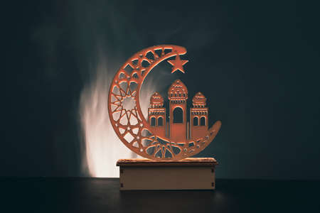 Ramadan Kareem background. Ornamental Arabic lantern glowing at nightの写真素材