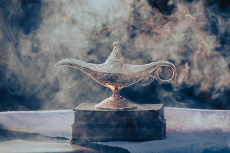 Ramadan Kareem festive greeting card for Muslim holy month with Aladdin lamp of wishes and Quranの写真素材