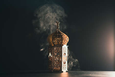 Ramadan Kareem background. Ornamental Arabic lantern glowing at nightの写真素材