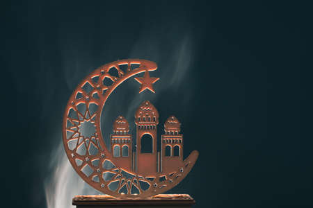 Ramadan Kareem background. Ornamental Arabic lantern glowing at nightの写真素材