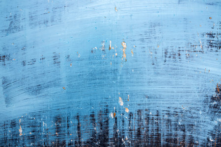 Old wooden background with blue paint. Vintage wood texture from beach in summer.
