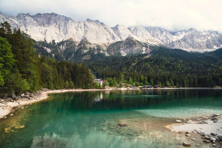 Faboulus landscape of Eibsee Lake with turquoise water in front of Zugspitze summit, Garmisch-Partenkirchen, Bavarian alps, Germany, Europeの写真素材
