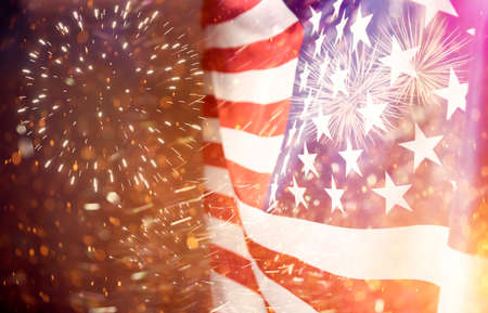 Celebrating Independence Day. United States of America USA flag with fireworks background for 4th of Julyの写真素材
