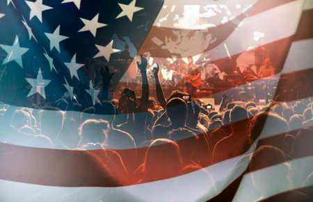 Crowd of people celebrating Independence Day. United States of America USA flag background for 4th...