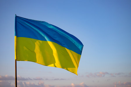 Detail of the national flag of Ukraine waving in the wind on a clear day. Democracy and politics.の写真素材