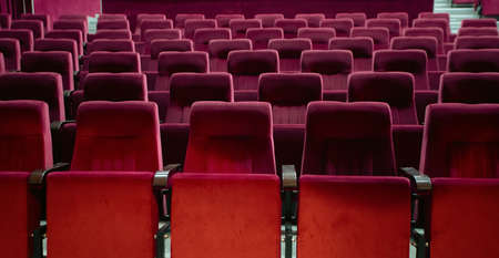 Empty cinema hall with red seats. Movie theatreの写真素材