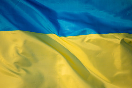 Flag of Ukraine, UA. Blue and yellow colors. Close up shot, backgroundの写真素材