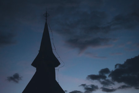 Church and spooky cloudy sky at night. Horror Halloween concept.の写真素材