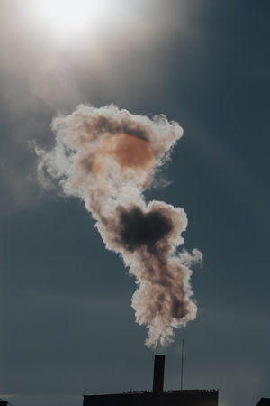 Air pollution from power plant chimneys. Industry and global warming conceptの写真素材