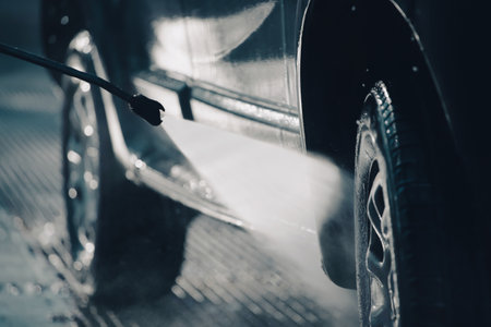 Car wash with pressurized water in car wash outside.の写真素材