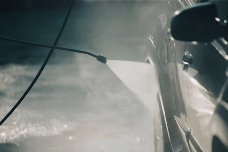 Car wash with pressurized water in car wash outside.の写真素材