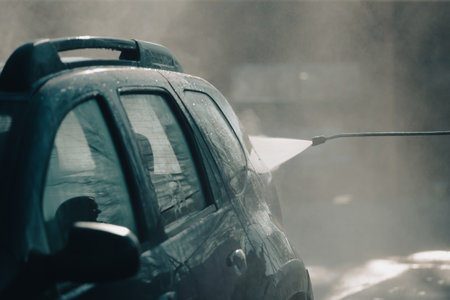 Car wash with pressurized water in car wash outside.の写真素材