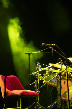 Microphone in colored spotlights and smoke. Concert and theatre sceneの写真素材