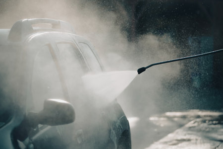 Car wash with pressurized water in car wash outside.の写真素材