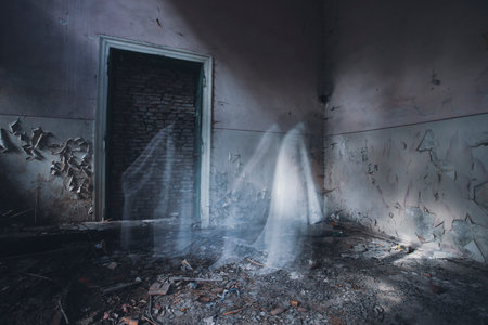 Ghost in abandoned, haunted house. Horror scene of scary spirit of a woman, halloween concept.の写真素材
