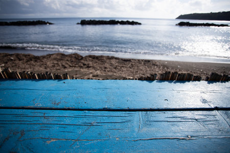Wooden pier, exotic sea and a blue sky. Beautiful summer background. Vacation and traveling concept.の写真素材