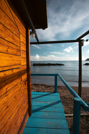 Colorful wooden hut on Chiaiai beach, Procida Island, Italy.の写真素材