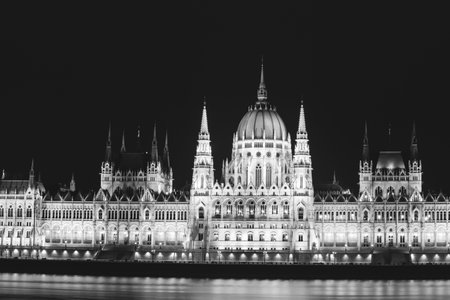 Night view of the illuminated building of the hungarian parliament in Budapestの写真素材
