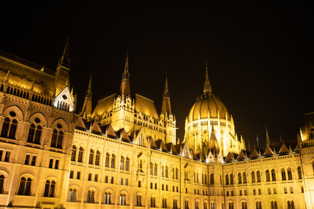 Night view of the illuminated building of the hungarian parliament in Budapestの写真素材