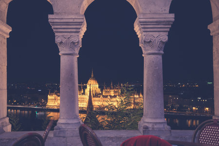 Night view of the illuminated building of the hungarian parliament in Budapestの写真素材