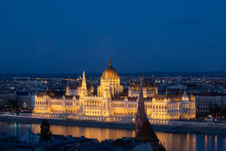 Night view of the illuminated building of the hungarian parliament in Budapestの写真素材