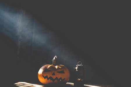 Jack O' Lantern glowing in smoky fantasy night. Halloween backgroundの写真素材