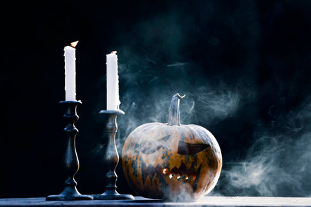 Jack O' Lantern glowing in smoky fantasy night. Halloween backgroundの写真素材