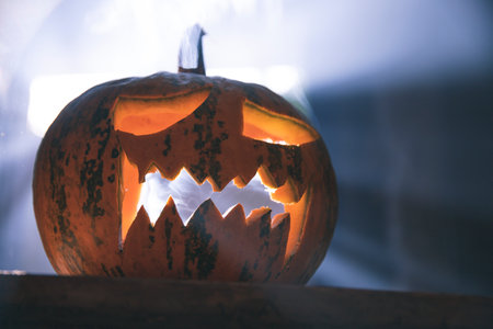 Jack O' Lantern glowing in smoky fantasy night. Halloween backgroundの写真素材