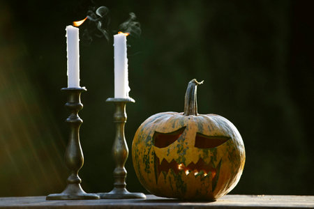 Jack O' Lantern glowing in smoky fantasy night. Halloween backgroundの写真素材