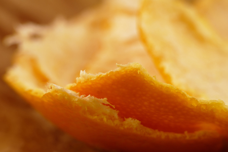 Macro of a fresh orange mandarin peelsの写真素材