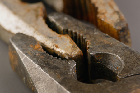 close-up of two old rusty pliersの写真素材