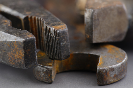 close-up of an old rusty pliers, hammer and wrenchの写真素材