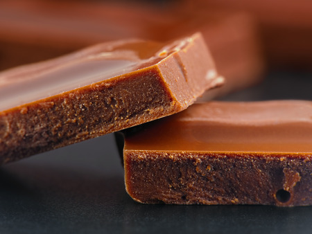 close-up of several pieces of milk chocolateの写真素材