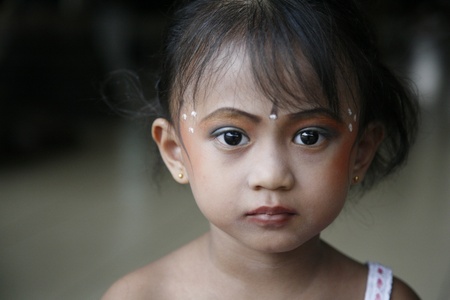 JAKARTA, INDONESIA - JULY 23, 2006: Young Balinese dancer is posing after performing her traditional Balinese dance on July 23, 2006 in Jakarta.のeditorial素材