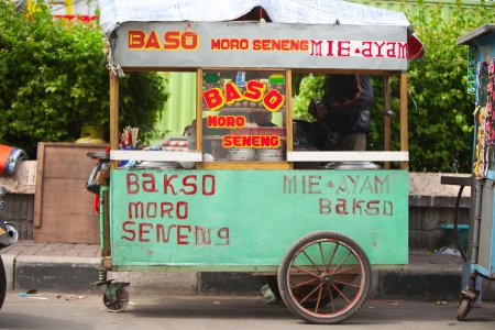 JAKARTA - DECEMBER 28, 2011: Indonesian food stall in Kota, Jakarta, december 28, 2011 in Indonesiaのeditorial素材