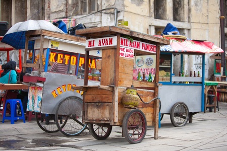 JAKARTA - DECEMBER 28, 2011: Indonesian food stalls in Kota, Jakarta, december 28, 2011 in Indonesiaのeditorial素材