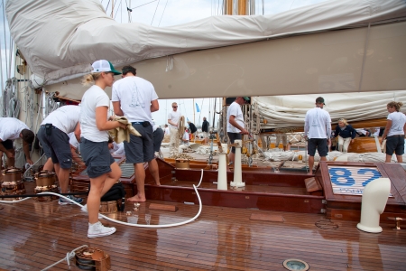 CANNES, FRANCE - SEPTEMBER 28, 2012: Unidentified crew members in the harbor after the 34th edition...