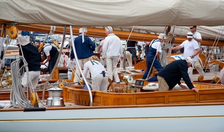 CANNES, FRANCE - SEPTEMBER 28, 2012: Unidentified crew members in the harbor after the 34th edition...